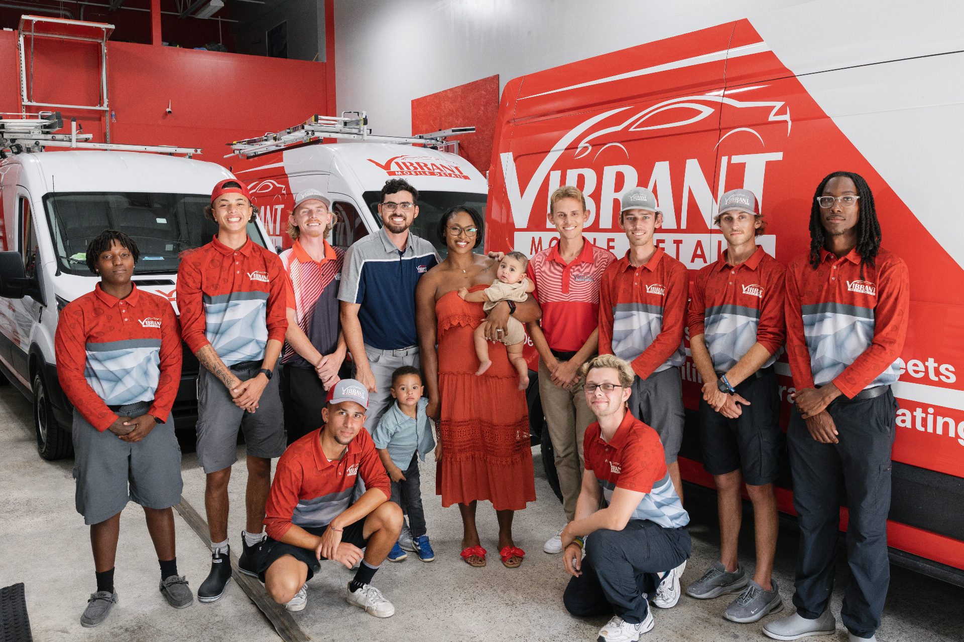 The Vibrant Mobile Detail team in front of their vans