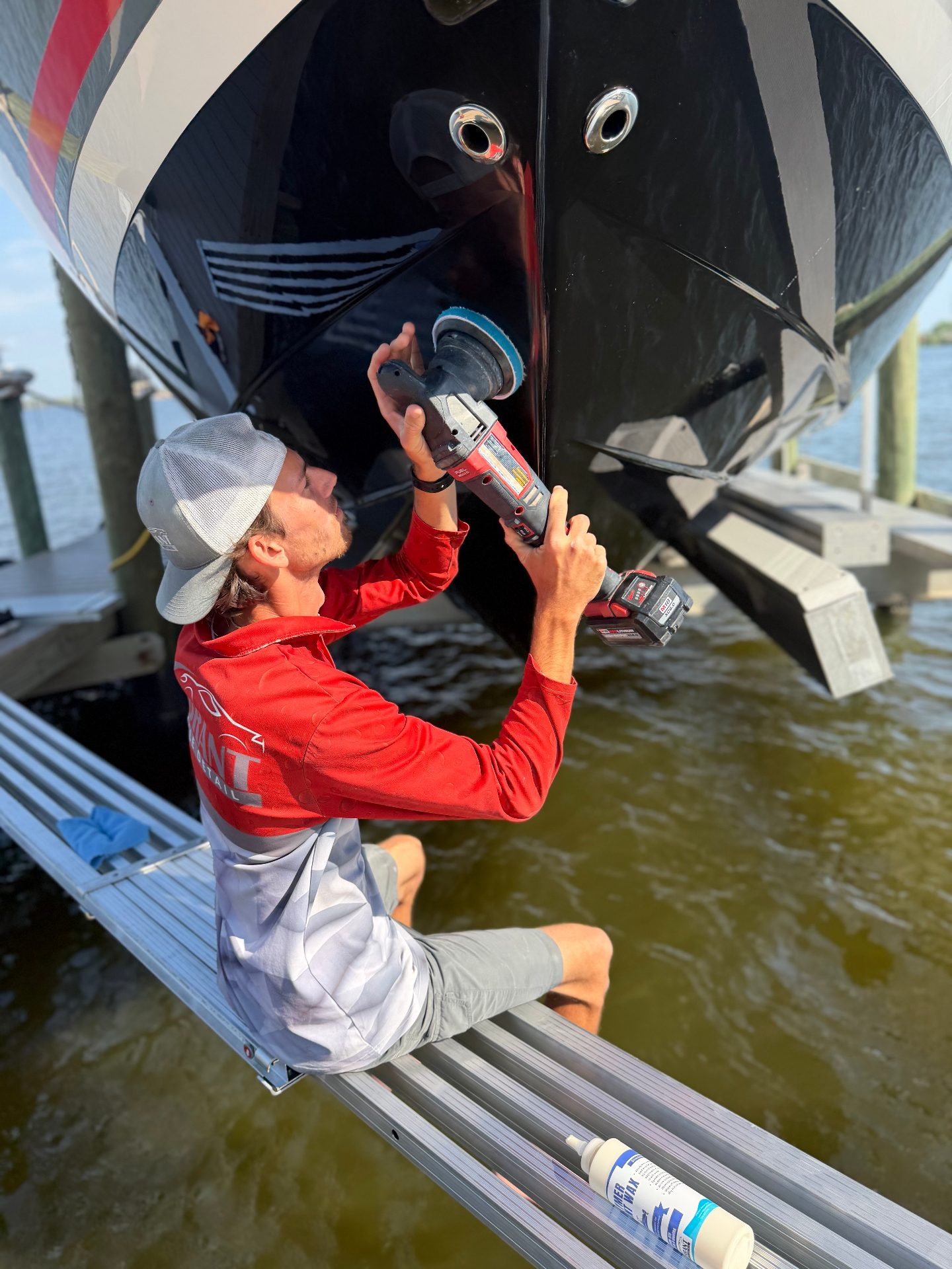 Hand-polishing every inch of the hull.